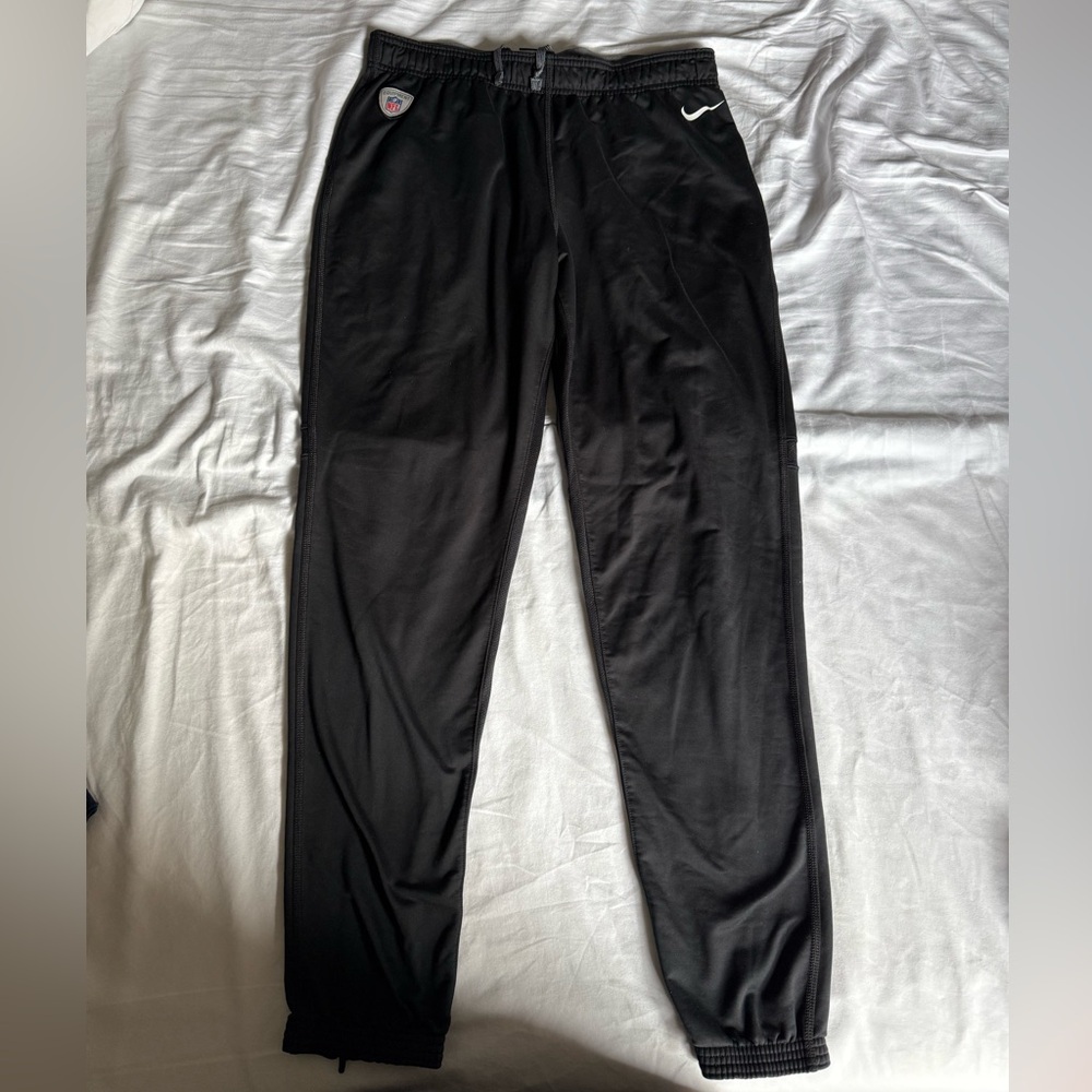 Nike Men's on field Black Joggers with NFL logo.  Official NFL player issued.